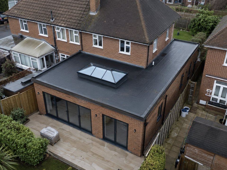 Completed rear extension from above with the flat roof, lantern and bifolds